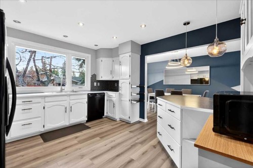 611 Lake Linnet Crescent Se, Calgary, AB - Indoor Photo Showing Kitchen With Upgraded Kitchen