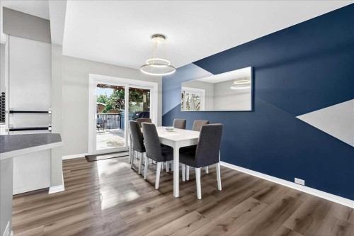 611 Lake Linnet Crescent Se, Calgary, AB - Indoor Photo Showing Dining Room