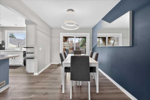 611 Lake Linnet Crescent Se, Calgary, AB - Indoor Photo Showing Dining Room