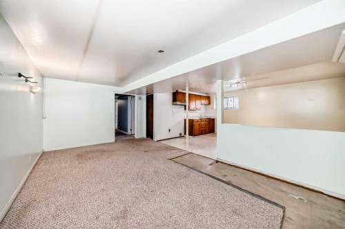 921 Mckinnon Drive Ne, Calgary, AB - Indoor Photo Showing Other Room