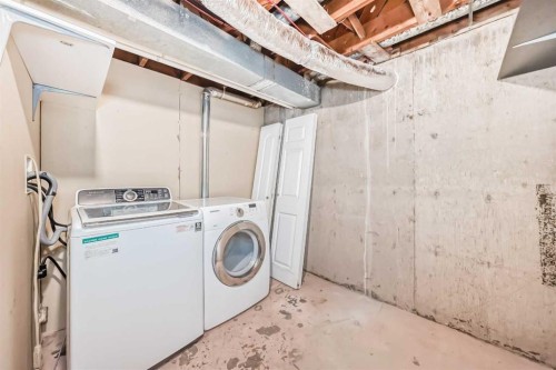 921 Mckinnon Drive Ne, Calgary, AB - Indoor Photo Showing Laundry Room