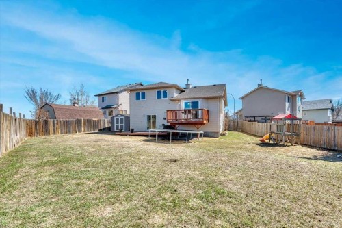 476 Highland Close, Strathmore, AB - Outdoor With Deck Patio Veranda With Backyard With Exterior