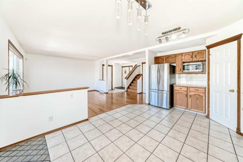 141 Arbour Crest Mews Nw, Calgary, AB - Indoor Photo Showing Kitchen