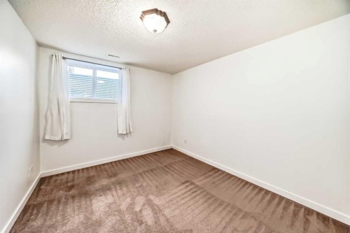 141 Arbour Crest Mews Nw, Calgary, AB - Indoor Photo Showing Other Room