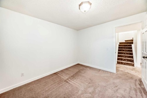 141 Arbour Crest Mews Nw, Calgary, AB - Indoor Photo Showing Other Room