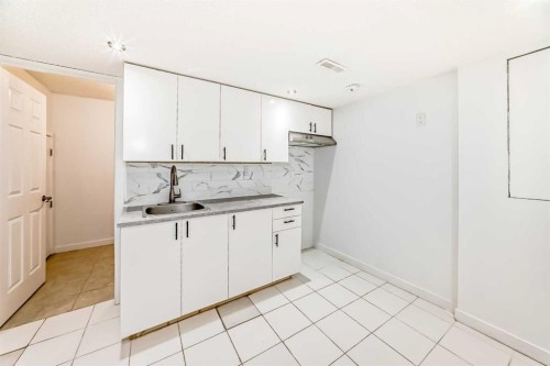 141 Arbour Crest Mews Nw, Calgary, AB - Indoor Photo Showing Kitchen