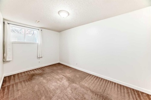 141 Arbour Crest Mews Nw, Calgary, AB - Indoor Photo Showing Other Room