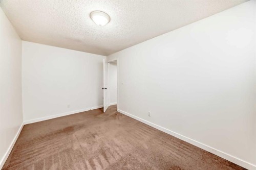 141 Arbour Crest Mews Nw, Calgary, AB - Indoor Photo Showing Other Room