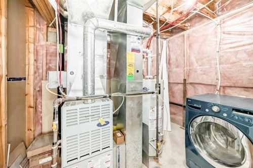 141 Arbour Crest Mews Nw, Calgary, AB - Indoor Photo Showing Laundry Room