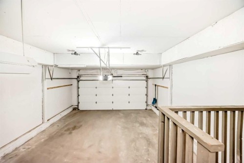 141 Arbour Crest Mews Nw, Calgary, AB - Indoor Photo Showing Garage
