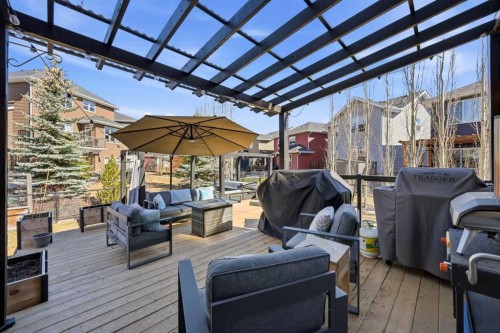 312 Sunset View, Cochrane, AB - Outdoor With Deck Patio Veranda With Exterior