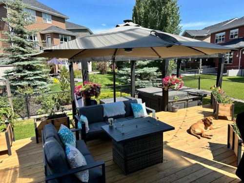 312 Sunset View, Cochrane, AB - Outdoor With Deck Patio Veranda