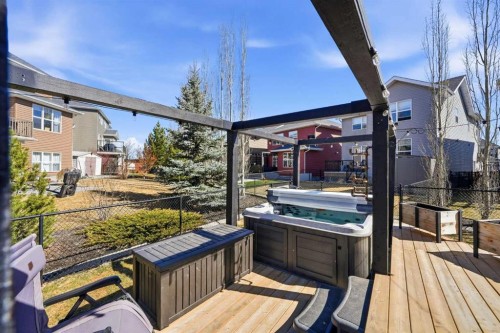 312 Sunset View, Cochrane, AB - Outdoor With Deck Patio Veranda With Exterior