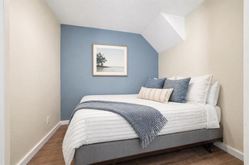 312 Sunset View, Cochrane, AB - Indoor Photo Showing Bedroom