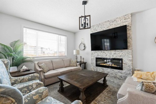 314 Walcrest Way Se, Calgary, AB - Indoor Photo Showing Living Room With Fireplace