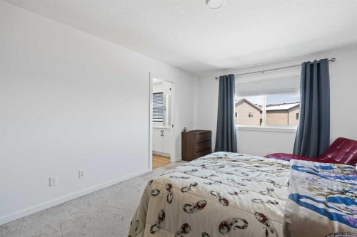 314 Walcrest Way Se, Calgary, AB - Indoor Photo Showing Bedroom