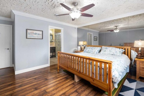 155 Croxford Estates Ne, Airdrie, AB - Indoor Photo Showing Bedroom
