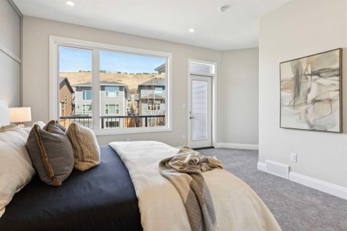 96 Cranbrook Way Se, Calgary, AB - Indoor Photo Showing Bedroom