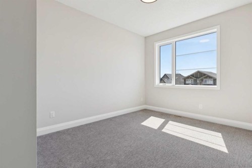 96 Cranbrook Way Se, Calgary, AB - Indoor Photo Showing Other Room