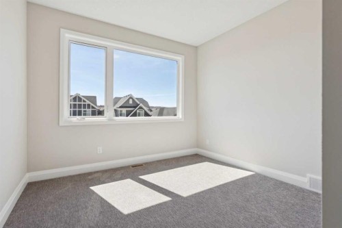 96 Cranbrook Way Se, Calgary, AB - Indoor Photo Showing Other Room