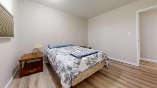 752 54 Avenue West, Claresholm, AB - Indoor Photo Showing Bedroom