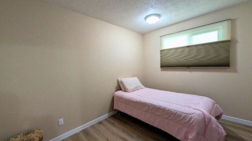 752 54 Avenue West, Claresholm, AB - Indoor Photo Showing Bedroom