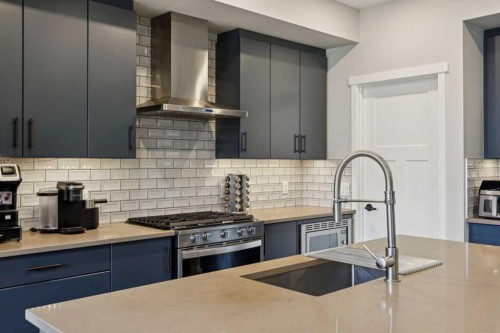 293 Masters Avenue Se, Calgary, AB - Indoor Photo Showing Kitchen With Stainless Steel Kitchen With Upgraded Kitchen