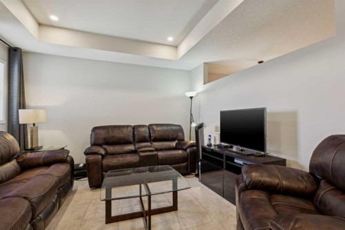 293 Masters Avenue Se, Calgary, AB - Indoor Photo Showing Living Room
