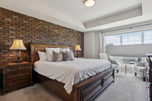 293 Masters Avenue Se, Calgary, AB - Indoor Photo Showing Bedroom