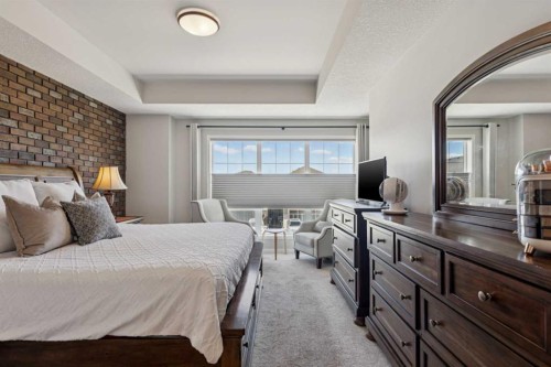 293 Masters Avenue Se, Calgary, AB - Indoor Photo Showing Bedroom