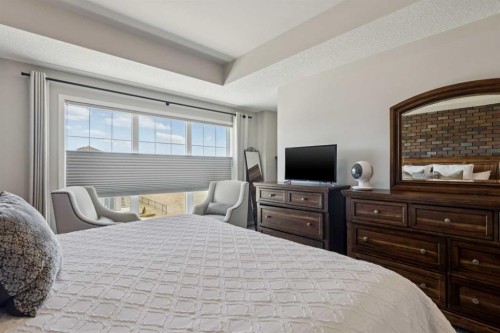 293 Masters Avenue Se, Calgary, AB - Indoor Photo Showing Bedroom