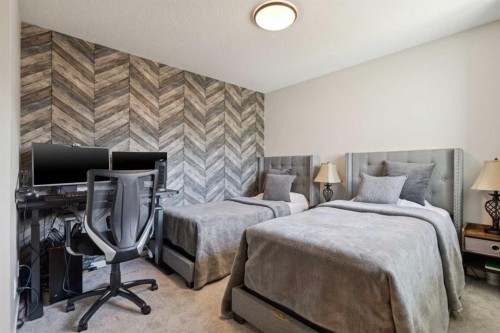 293 Masters Avenue Se, Calgary, AB - Indoor Photo Showing Bedroom