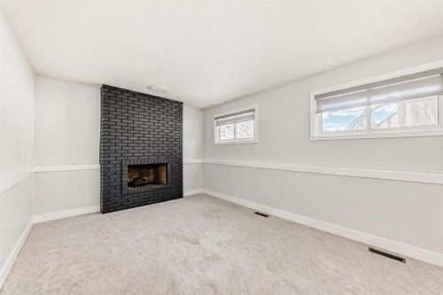 204 Whiteview Close Ne, Calgary, AB - Indoor With Fireplace