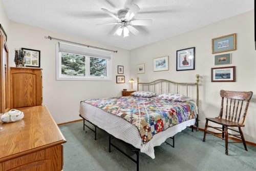 1415 108 Avenue Sw, Calgary, AB - Indoor Photo Showing Bedroom