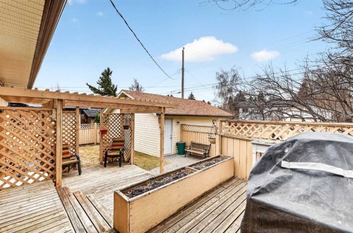 1415 108 Avenue Sw, Calgary, AB - Outdoor With Deck Patio Veranda