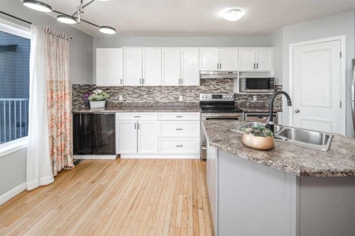 10 Somerset Court Sw, Calgary, AB - Indoor Photo Showing Kitchen With Double Sink With Upgraded Kitchen