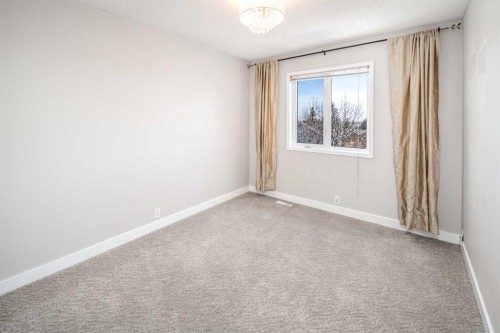 10 Somerset Court Sw, Calgary, AB - Indoor Photo Showing Other Room