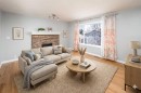 10 Somerset Court Sw, Calgary, AB  - Indoor Photo Showing Living Room With Fireplace 
