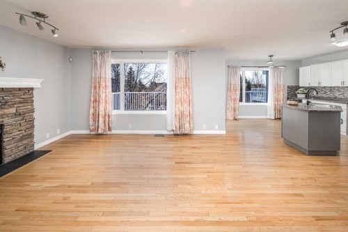10 Somerset Court Sw, Calgary, AB - Indoor With Fireplace