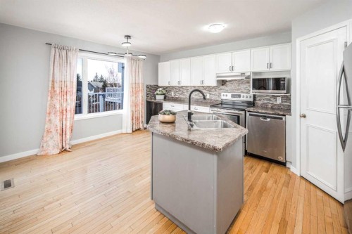 10 Somerset Court Sw, Calgary, AB - Indoor Photo Showing Kitchen With Double Sink With Upgraded Kitchen
