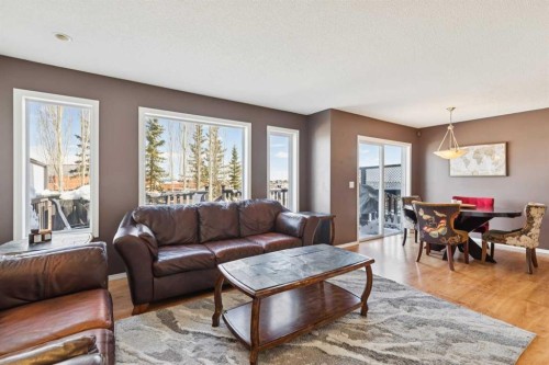 18 Bridlewood Way Sw, Calgary, AB - Indoor Photo Showing Living Room
