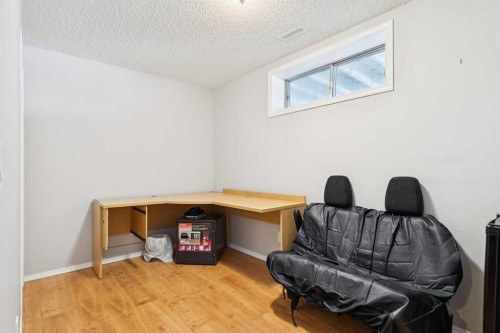 18 Bridlewood Way Sw, Calgary, AB - Indoor Photo Showing Other Room