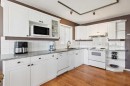 18 Bridlewood Way Sw, Calgary, AB  - Indoor Photo Showing Kitchen 