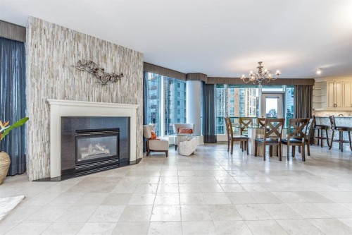 404-837 2 Avenue Sw, Calgary, AB - Indoor Photo Showing Living Room With Fireplace