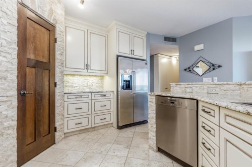 404-837 2 Avenue Sw, Calgary, AB - Indoor Photo Showing Kitchen With Stainless Steel Kitchen With Upgraded Kitchen