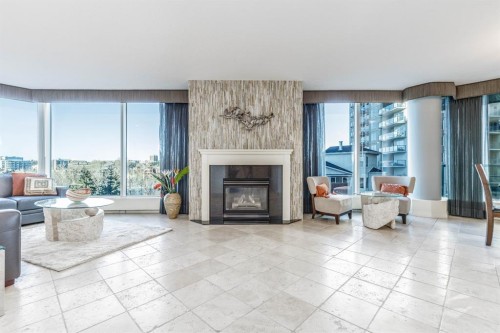 404-837 2 Avenue Sw, Calgary, AB - Indoor Photo Showing Living Room With Fireplace