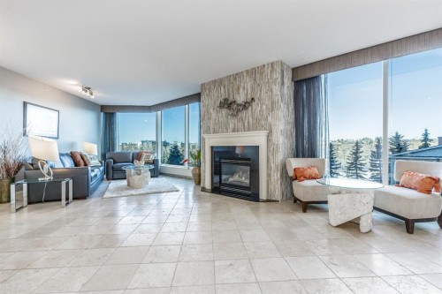 404-837 2 Avenue Sw, Calgary, AB - Indoor Photo Showing Living Room With Fireplace