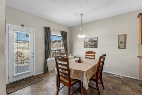 149 Saddlecrest Green Ne, Calgary, AB - Indoor Photo Showing Dining Room