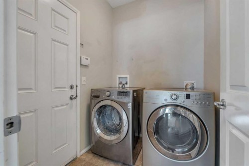 149 Saddlecrest Green Ne, Calgary, AB - Indoor Photo Showing Laundry Room
