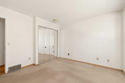 404 Manora Way Ne, Calgary, AB - Indoor Photo Showing Other Room